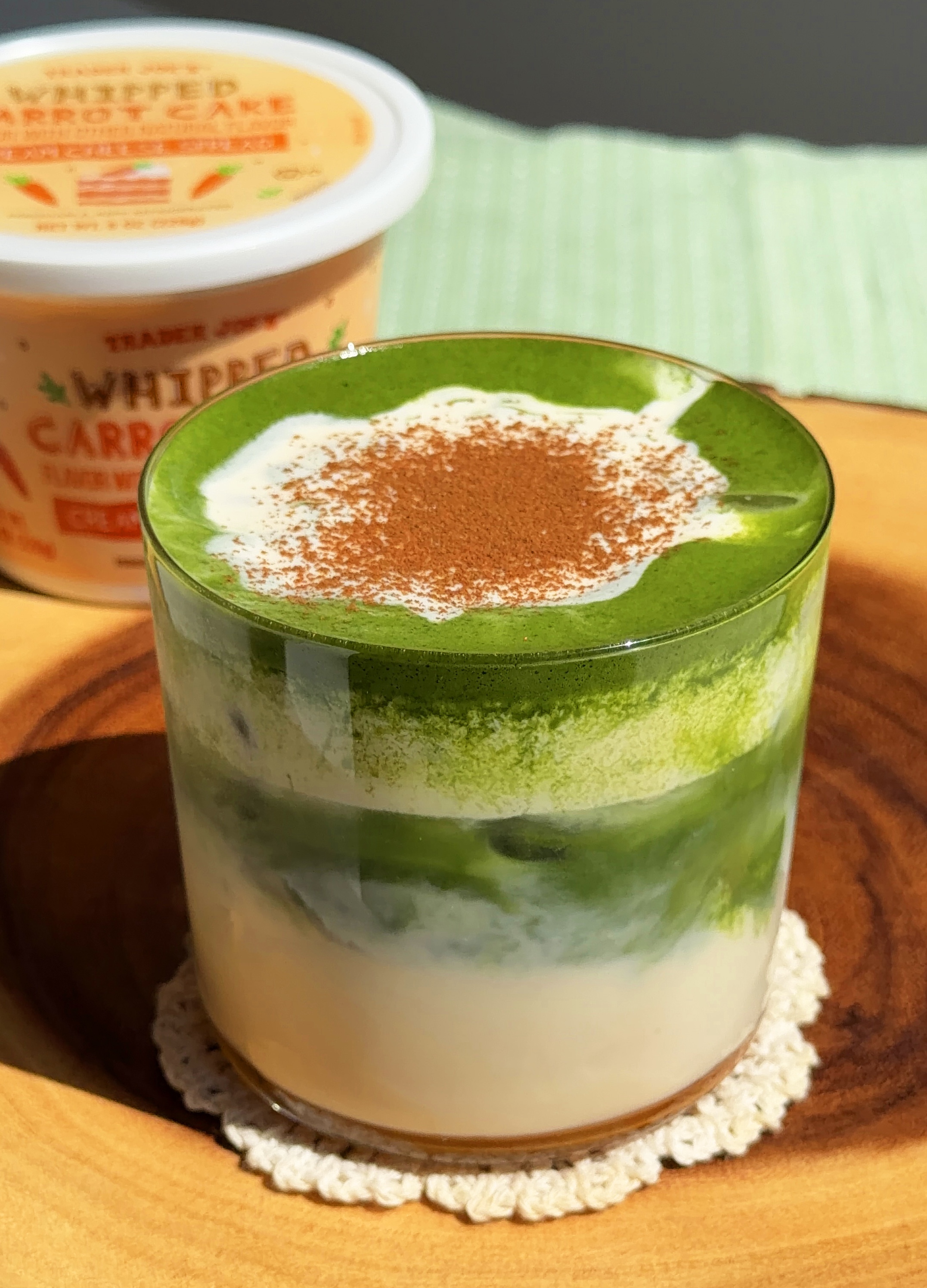 Carrot cake matcha latte with a sprinkle of cinnamon