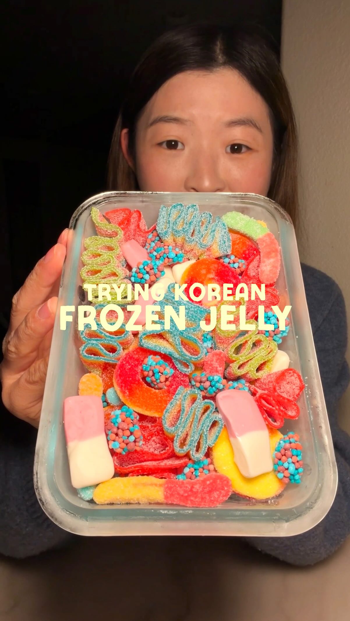 Assorted frozen gummies including sour belts, peach rings, and Nerds gummy clusters